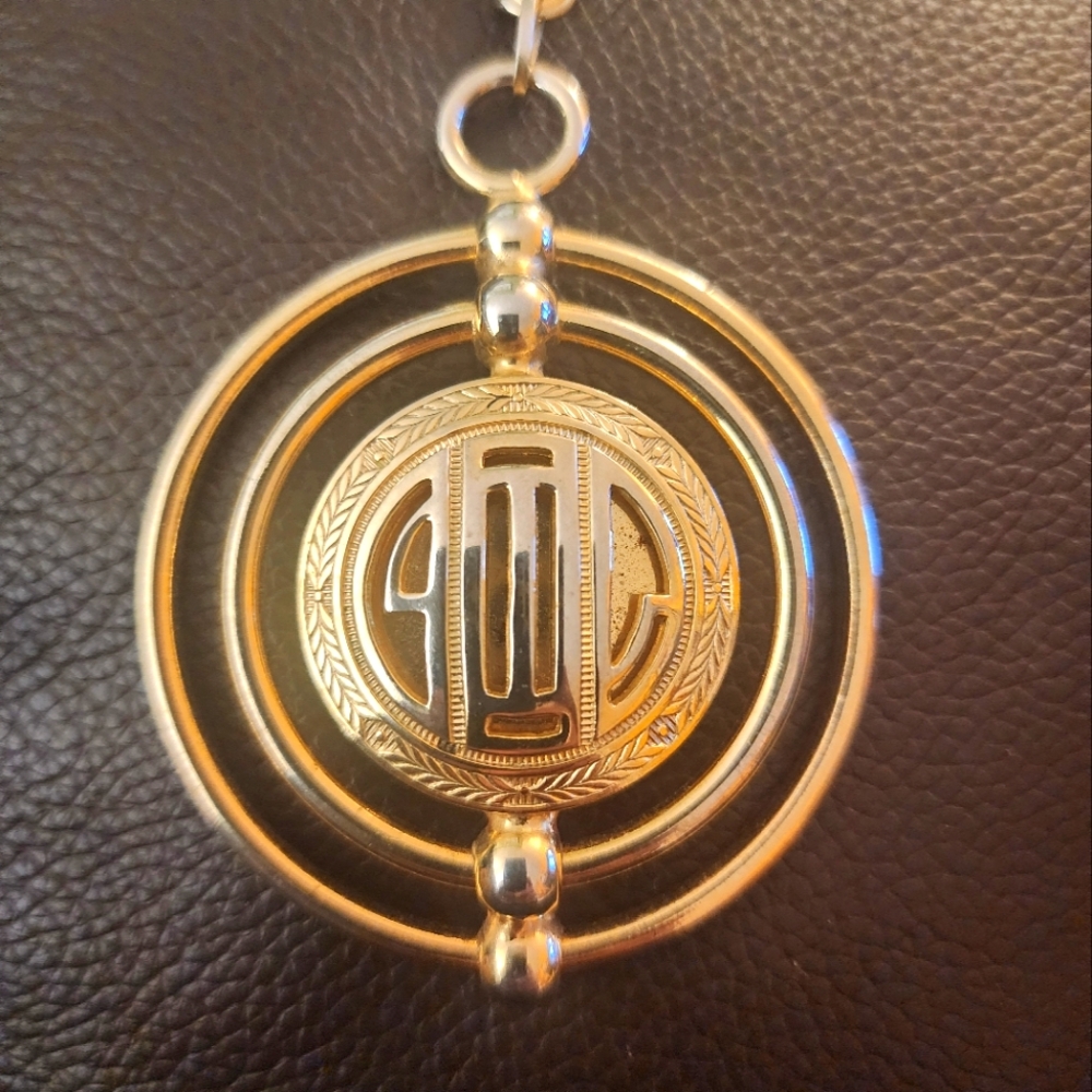 Gold Circular Pendant Necklace